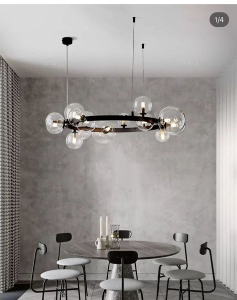 Bubble Balls Nordic Chandelier illuminated above a dining table in Lagos